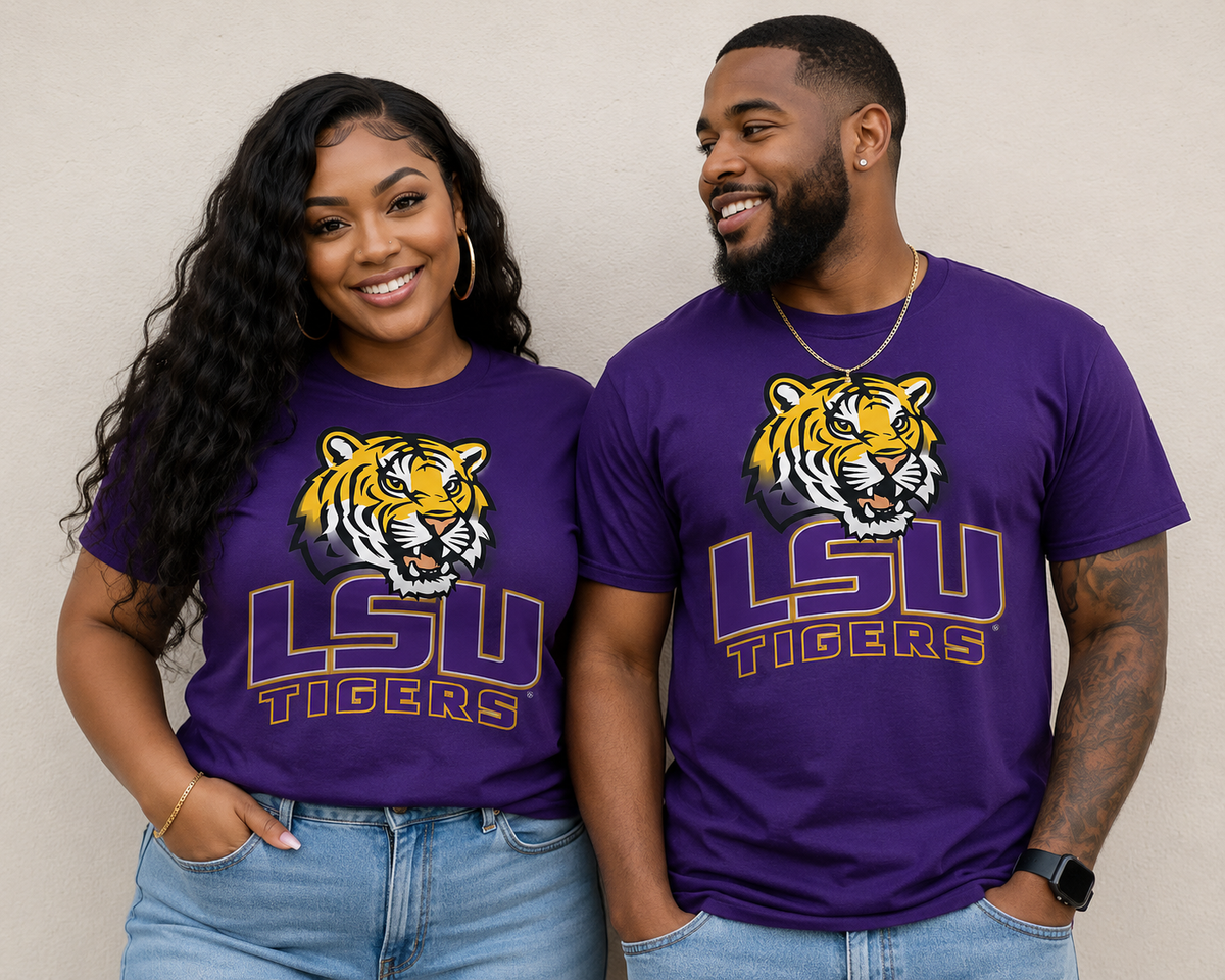 Couple wearing black LSU Tigers drip art tiger graphic tees